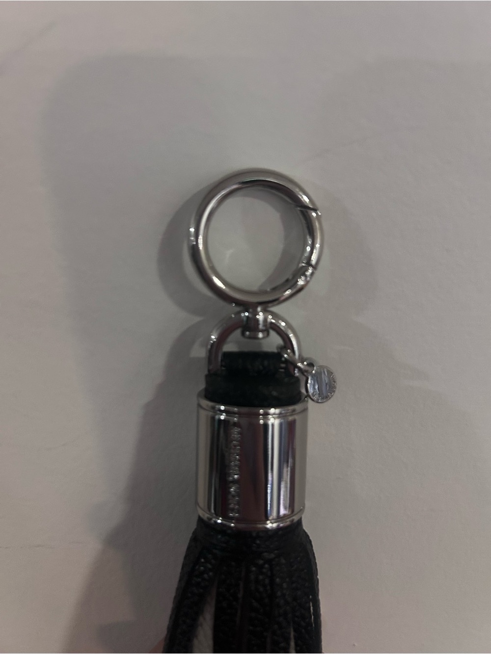 Michael Kors Black and Light Gray Leather Tassel Key Charm with Silver Hardware - Picture 4 of 5